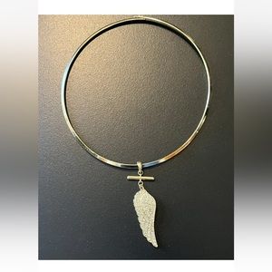 Gold tone choker necklace with rhinestone wing. Eva Jeanbart LoRenzotti